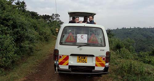 Safari minivan ready for a Nairobi National Park tour with Cruzeiro Safaris Kenya, offering wildlife game drives near Nairobi city